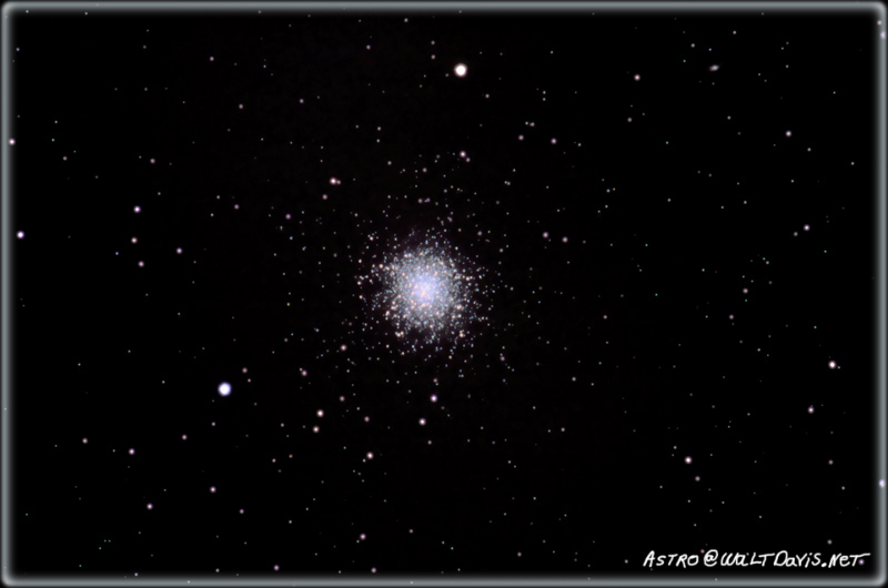 M13 (The Hercules Globular Cluster) is one of the most prominent and best known globular cluster of the Northern celestial hemisphere. Also known as the ‘Great Hercules Globular Cluster. This picture was taken with a Nikon D70, 600mm f4 ED Lens, and TC-301 2x Teleconverter. By Walt Davis.
